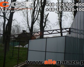 Garaż blaszany 10x6 dwuspadowy grafit RAL7016 brama dwuskrzydłowa z zadaszeniem 